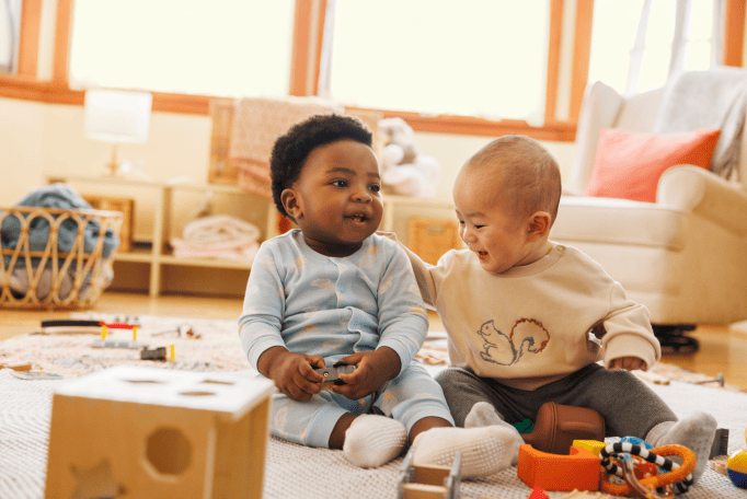 assets.images.babies-playing-toys.alt